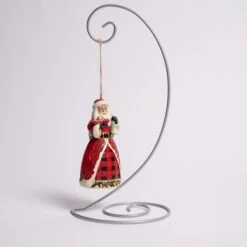 Santa Holding Red Truck Ornament